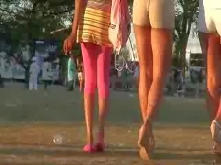Tight pants girls are walking in front of me deliciously waving the great asses