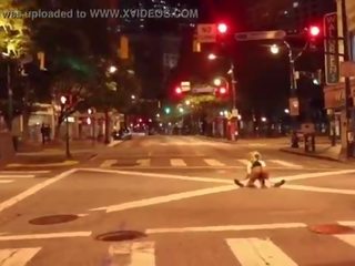 Clown gets phallus sucked in middle of the street